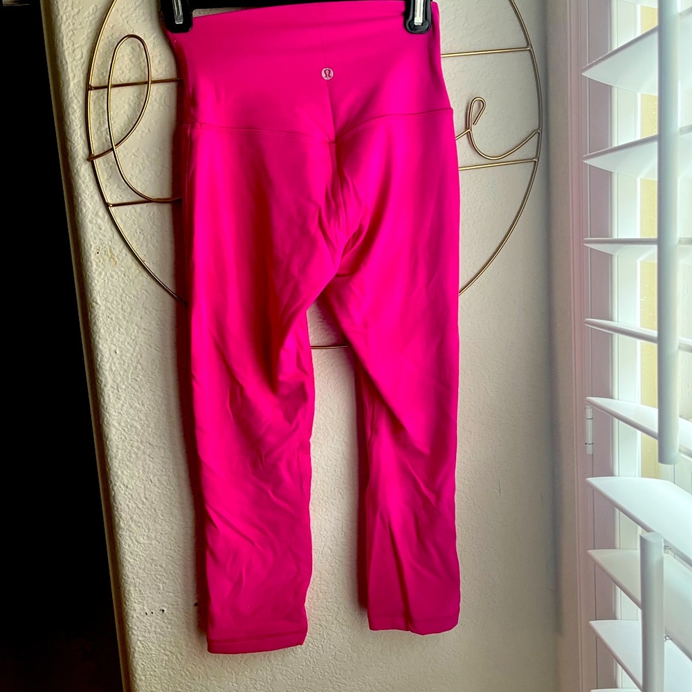 Super cute pink lululemon wonder under high waisted leggings! Worn only 2 times